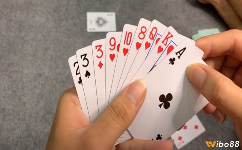 Đánh rác hợp lý và gửi bài tối ưu để giảm điểm rác trong cách chơi phỏm 9 cây